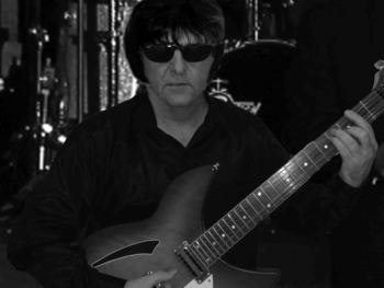 Paul Kaye as Roy Orbison