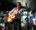 Jim Mullen appearing at this event
