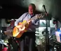 Jim Mullen appearing at this event