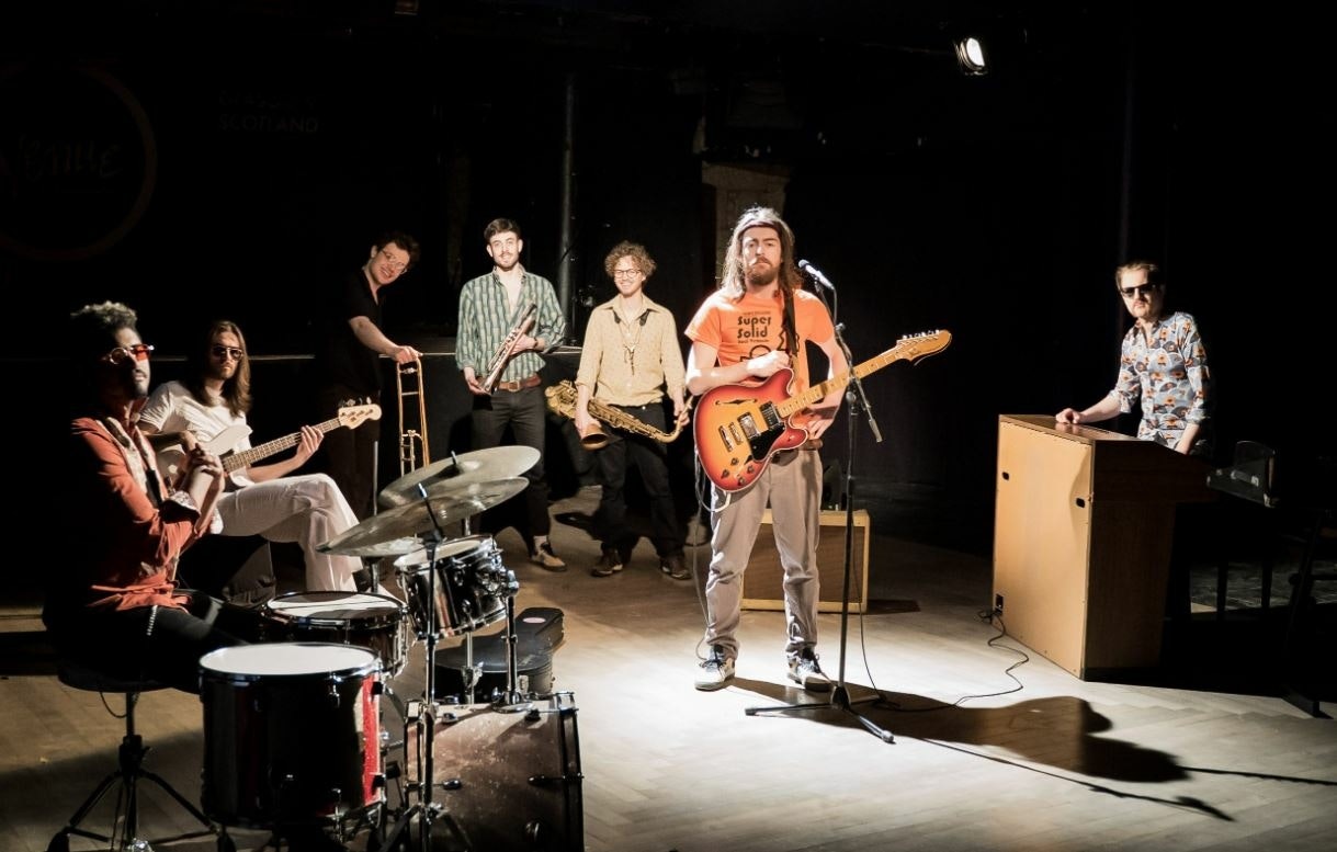 Tom McGuire & The Brassholes appearing at this event