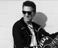 Chris Isaak appearing at this event